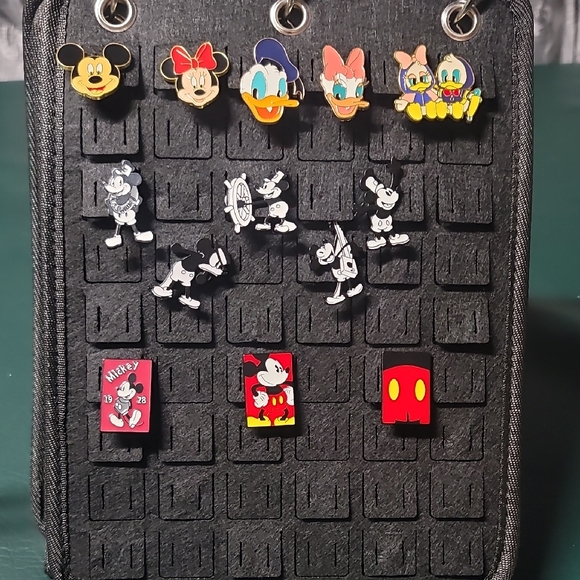 Other - **Disney Character Pin Collection on Black Display Case**